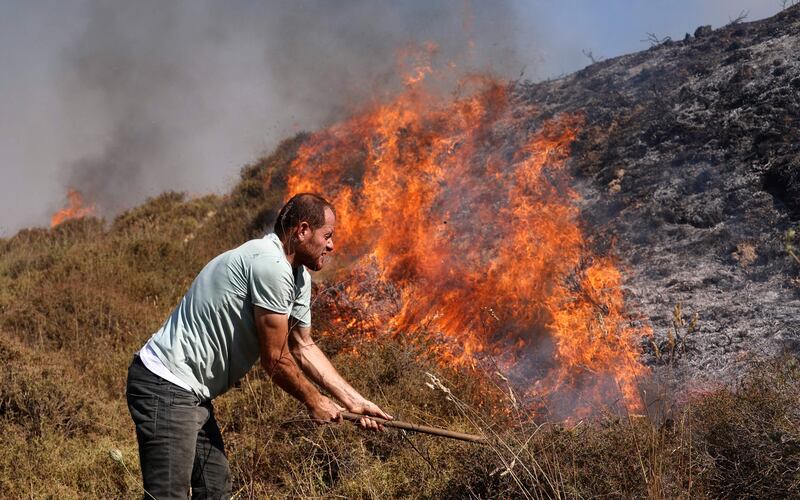 The field was set ablaze by Israelis from the settlement of Yitzhar, according to witnesses from the village council. AFP