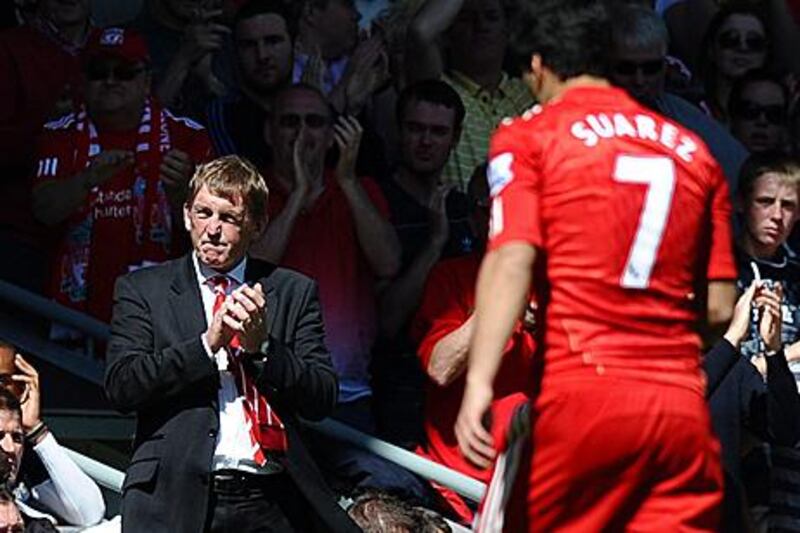 Liverpool's form since Kenny Dalglish, left, replaced Roy Hodgson on January 8 has been impressive.