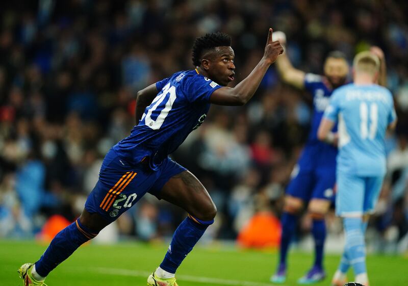 Vinicius Junior celebrates scoring. PA