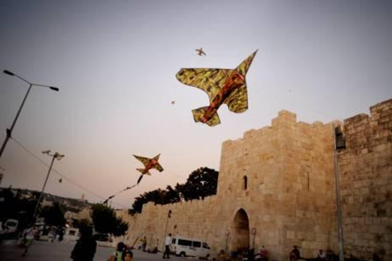 Palestinian kids are flying kites in the Old City of Jerusalem (by Damascus gate) on Thursday, July 21st, 2011.
Photo by: Ilan Mizrahi
