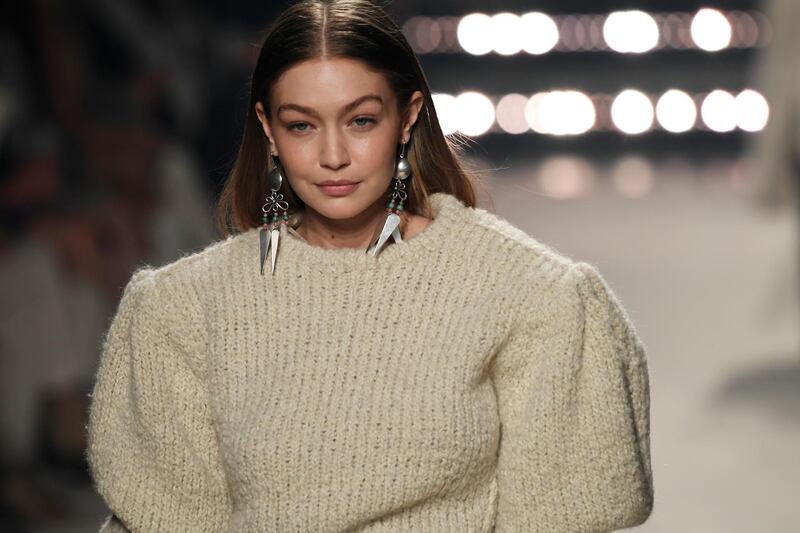 epa08253948 US model Gigi Hadid presents a creation by French designer Isabel Marant from the Fall-Winter 2020/21women's collection for Isabel Marant fashion house during the Paris Fashion Week, in Paris, France, 27 February 2020. The Fall-Winter 2020/21 women's collection runs from 24 February to 03 March 2020.  EPA-EFE/JULIEN DE ROSA