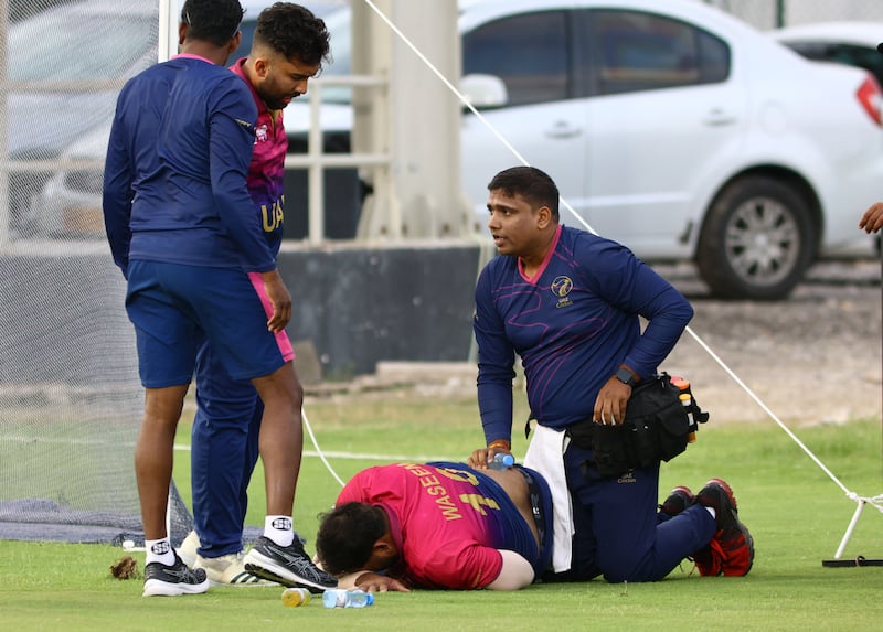UAE skipper Muhammad Waseem, who made 45 off 25 balls, receives treatment for an injury.