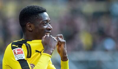 FILE -  In this April 29 2017 file photo,  Dortmund's Ousmane Dembele attends the Bundesliga soccer match between  Borussia Dortmund and 1. FC Cologne in Dortmund. Borussia Dortmund says Sunday Aug. 13, 2017  France forward Ousmane Dembele remains suspended from team training "until further notice" as he agitates for a move to Barcelona. Dembele has reportedly refused all contact with the club since Barcelona made a bid reported to be worth 105 million euros ($124 million) including add-ons.  (Bernd Thissen/dpa via AP,file)