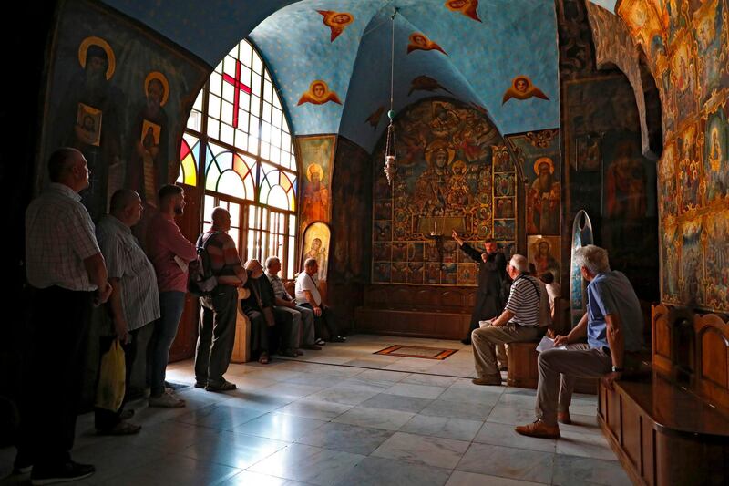 Tourists visit the Greek Orthodox monastery of St Sabbas, also known as Mar Saba, overlooking the Kidron Valley in the West Bank south of the biblical town of Bethlehem.  AFP