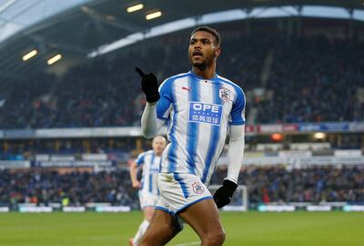 Soccer Football - Premier League - Huddersfield Town vs Brighton & Hove Albion - John Smith’s Stadium, Huddersfield, Britain - December 9, 2017   Huddersfield Town’s Steve Mounie celebrates scoring their second goal    Action Images via Reuters/Ed Sykes    EDITORIAL USE ONLY. No use with unauthorized audio, video, data, fixture lists, club/league logos or "live" services. Online in-match use limited to 75 images, no video emulation. No use in betting, games or single club/league/player publications. Please contact your account representative for further details.