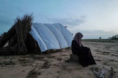A young victim of sexual violence in El Geneina, West Darfur, Sudan, outside a makeshift shelter in Adre, Chad. Reuters