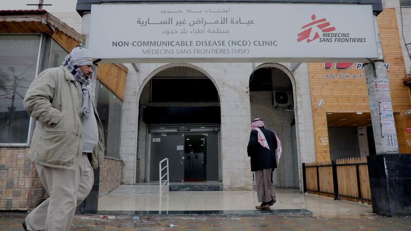 Patients enter the MSF non-communicable diseases clinic in Irbid. Jordan, March 2020. Photo: Mohammed Sanabani / MSF