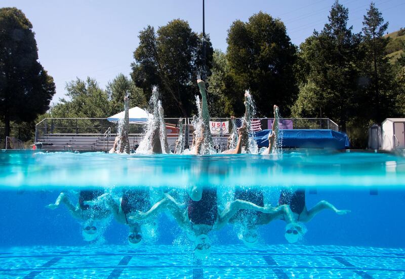 The US National Artistic Swimming team trains for the Tokyo Olympics at the SODA Aquatic center in Moraga, California on Wednesday, May 4. Reuters