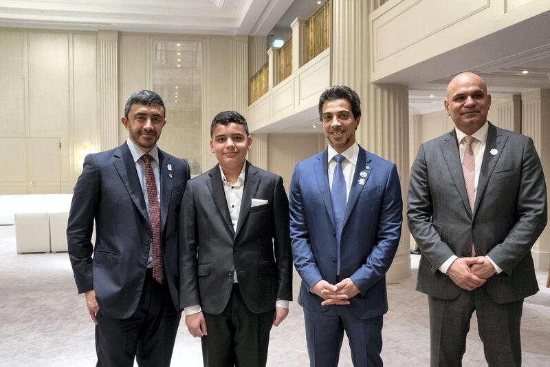 BERLIN, GERMANY - June 12, 2019: HH Sheikh Abdullah bin Zayed Al Nahyan UAE Minister of Foreign Affairs and International Cooperation (L) and HH Sheikh Mansour bin Zayed Al Nahyan, UAE Deputy Prime Minister and Minister of Presidential Affairs (2nd R), stand for a photograph with an Emirati student who is studying in Germany. Seen with Seen with HE Ali Abdullah Al Ahmed, UAE Ambassador to Germany (R).

(Eissa Al Hammadi / For the Ministry of Presidential Affairs )