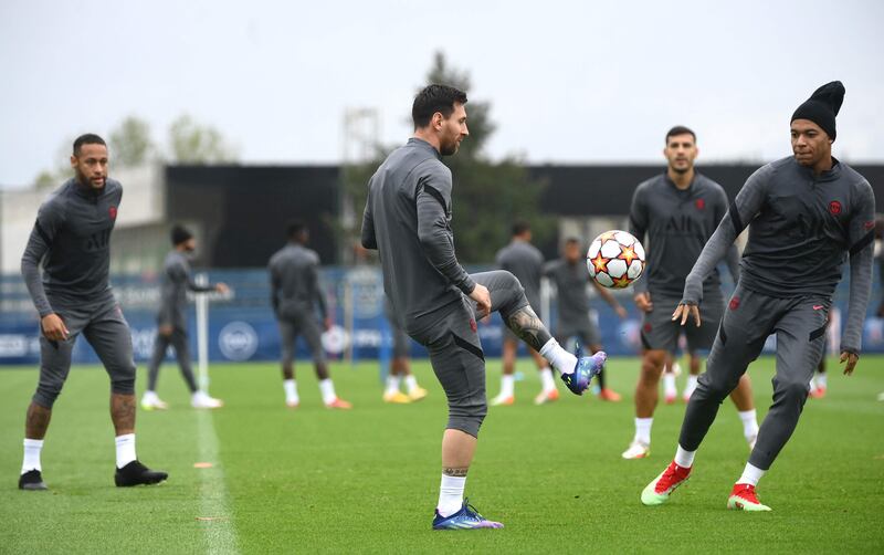 Lionel Messi trains with Neymar and Kylian Mbappe. AFP
