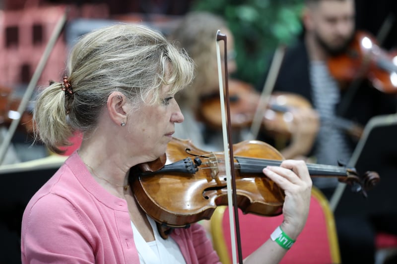 A member of the National Symphony Orchestra at the rehearsals.
