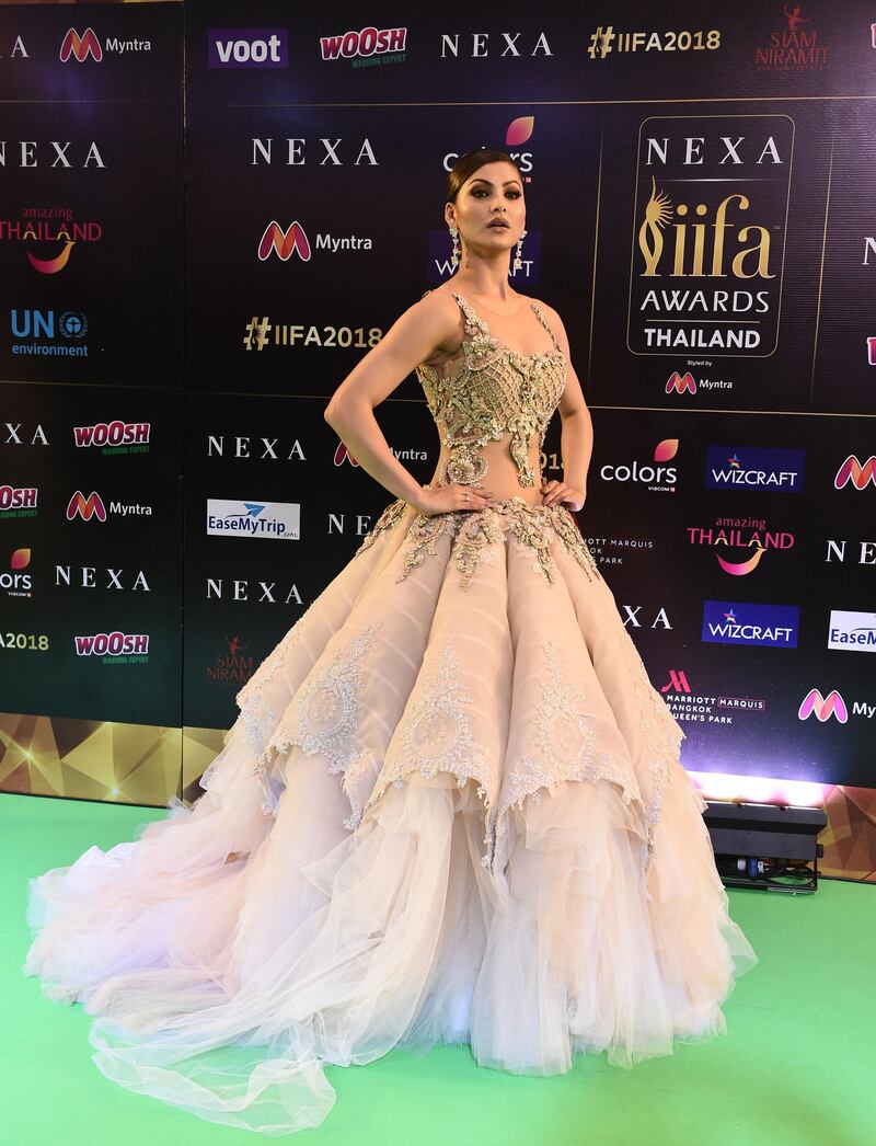 Urvashi Rautela tweeted that this gown, which she wore on the last night, weighed 80 kilograms. It's by Archana Kochhar. AFP