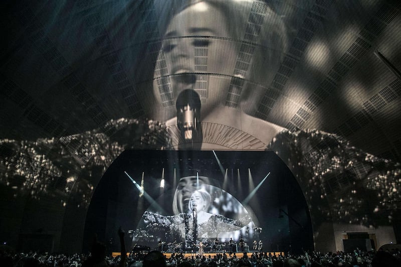 Adele performing at New York’s Radio City Music Hall in 2015. Devlin worked with the singer again in 2016 for her world tour, which began in Belfast