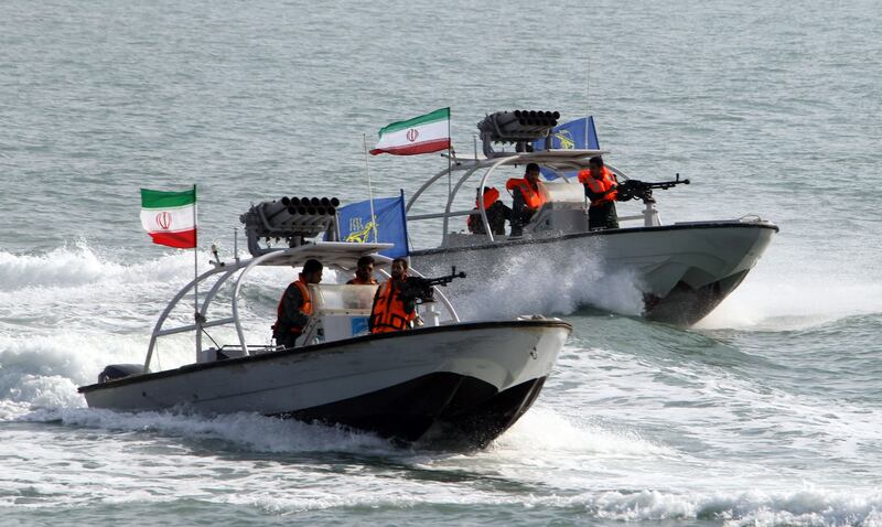 Members of the Islamic Revolutionary Guard Corps in speedboats near the port of Bandar Abbas, close to where seized ships were seen on satellite images. AFP