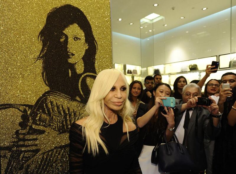 Italian designer Donatella Versace made an appearance at her eponymous label’s three boutiques in Dubai Mall. Charles Crowell for The National