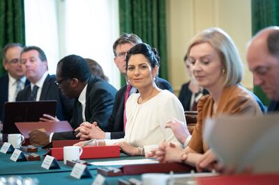 The opposition said Home Secretary Priti Patel, centre, should resign over her department's failings. Getty 