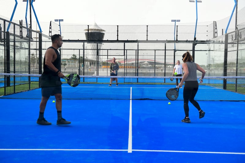 A group of friends play padel at the recently opened facility.