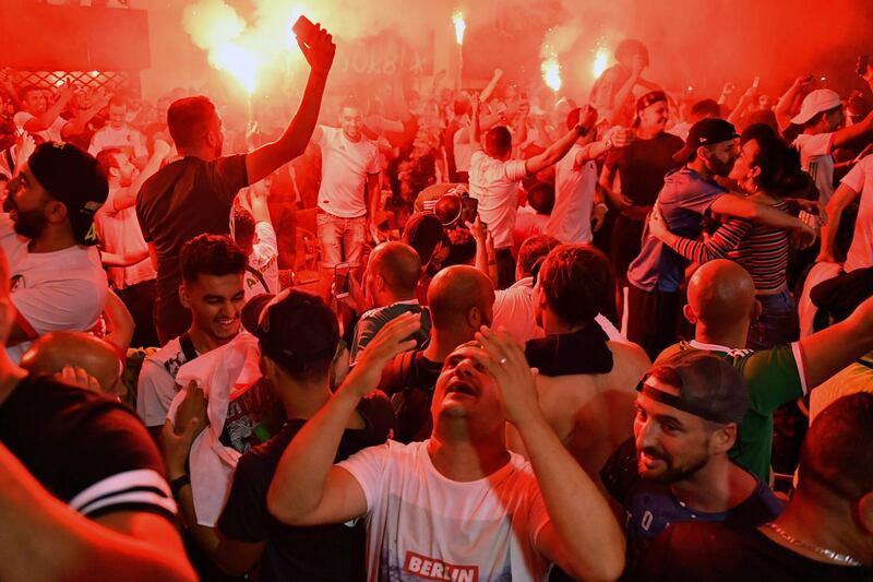 A fan reacts as Algeria supporters gather to watch the final in Marseille in France. AFP