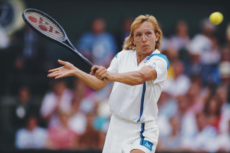 Martina Navratilova of the United States makes a back hand return during the Women's Singles  Final match against Steffi Graf at the Wimbledon Lawn Tennis Championship on 4 July 1987 at the All England Lawn Tennis and Croquet Club in Wimbledon in London, England. (Photo by Chris Cole/Getty Images)