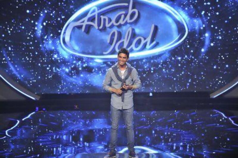 Mohammed Assaf performs during an epsiode of Arab Idol.