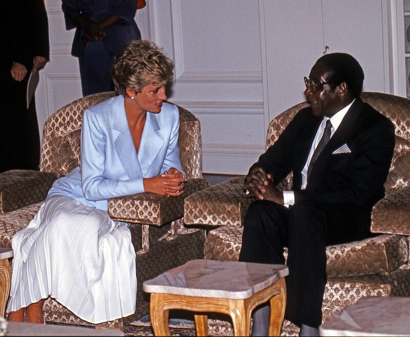 Mandatory Credit: Photo by David Hartley/Shutterstock (665646f)
Princess Diana Meets President Robert Mugabe
British Royal visit to Zimbabwe - 1993