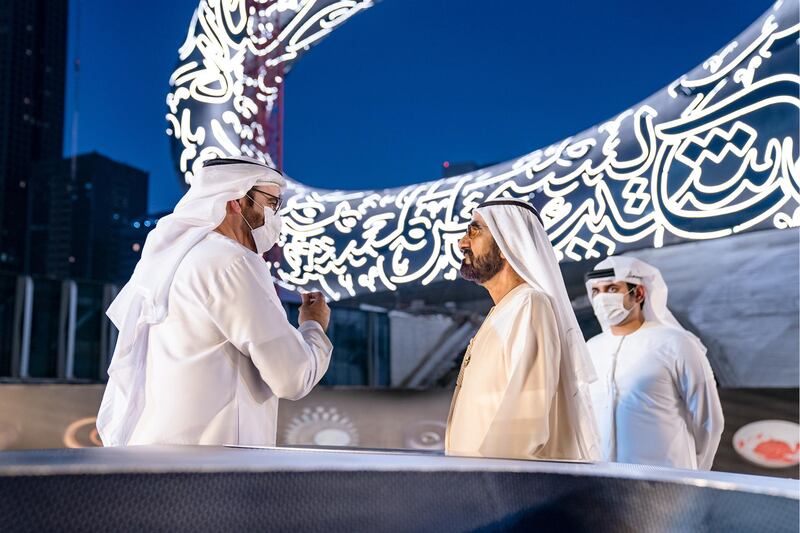 Sheikh Mohammed Bin Rashid, Vice-President and Prime Minister of the UAE and Ruler of Dubai, witnesses the installation of the final piece of façade of Museum of the Future. Seen with Sheikh Hamdan bin Mohammed bin Rashid Al Maktoum, Dubai Crown Prince and Chairman of The Executive Council of Dubai and Chairman of the Board of Trustees of Dubai Future Foundation; and Sheikh Maktoum bin Mohammed bin Rashid Al Maktoum, Deputy Ruler of Dubai. Seen with Mohammad bin Abdullah Al Gergawi, Cabinet Member, Minister of Cabinet Affairs, and Vice Chairman of the Board of Trustees of Dubai Future Foundation and Sheikh Maktoum bin Mohammed bin Rashid Al Maktoum, Deputy Ruler of Dubai. Courtesy Museum of the Future