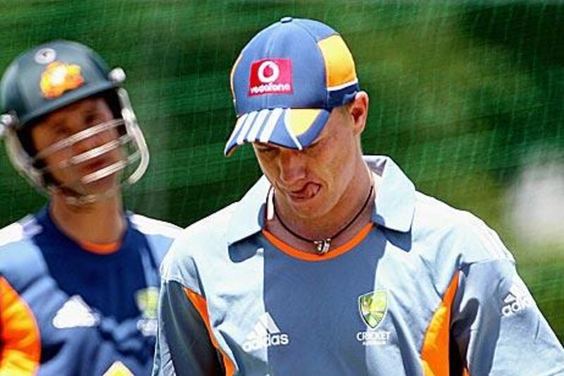 Xavier Doherty, right, receives some instruction from the Australia captain Ricky Ponting at Cricket Australia Centre of Excellence on November 22, 2010 in Brisbane.