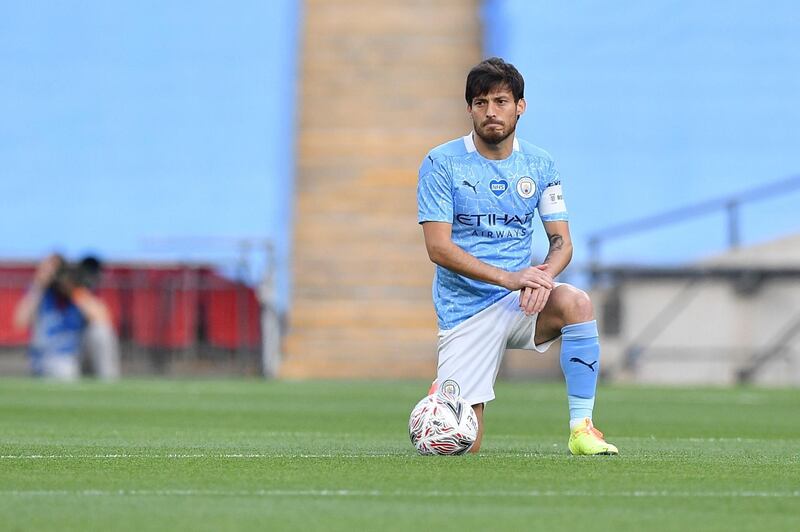 David Silva - 6: Found it hard to pull the strings, for once, in a crowded midfield. EPA