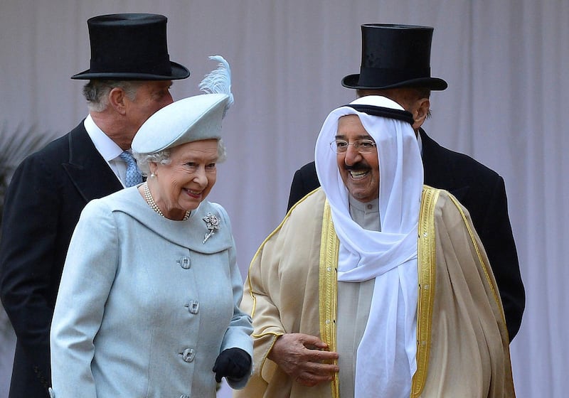 WINDSOR, ENGLAND - NOVEMBER 27:  The Amir Sheikh Sabah Al-Ahmad Al-Jaber Al-Sabah of Kuwait chats with Queen Elizabeth II as he arrives at Windsor Castle during a three-day state visit on November 27, 2012 in Windsor, England. In the afternoon a military parade will be inspected at Royal Military Academy Sandhurst then a banquet is to be held at Windsor Castle in the Amir's honour this evening.  (Photo by Toby Melville - WPA Pool/Getty Images)