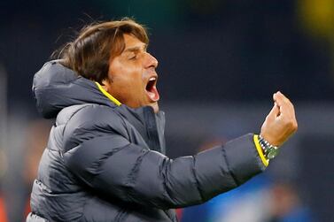 Inter Milan coach Antonio Conte watches his side slump to a 3-2 defeat at Borussia Dortmund after leading 2-0. Reuters