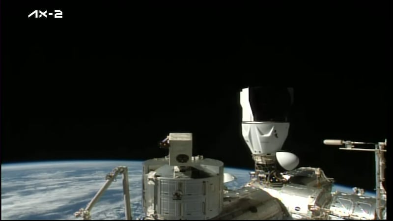 The Dragon capsule docks at the ISS