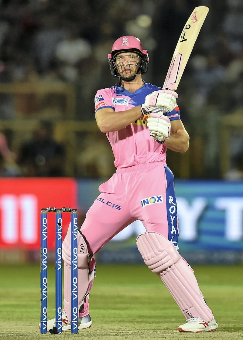Rajasthan Royals' Jos Buttler looks on after playing a shot during the 2019 Indian Premier League (IPL) Twenty20 cricket match between Rajasthan Royals and Kings XI Punjab at the Sawai Mansingh stadium in Jaipur on March 25, 2019. (Photo by Money SHARMA / AFP) / IMAGE RESTRICTED TO EDITORIAL USE - STRICTLY NO COMMERCIAL USE