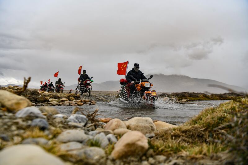 A border defence team patrols Changgo township in south-west China's Tibet Autonomous Region. EPA 