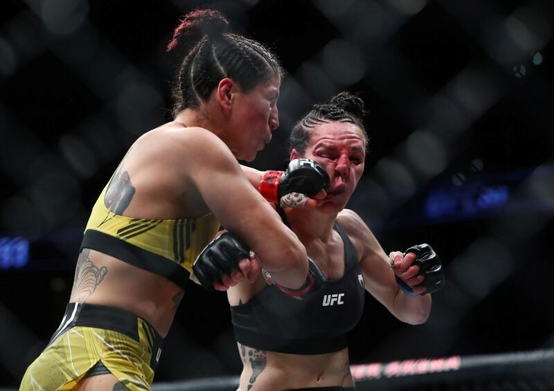 Pannie Kianzad lands a punch during her victory over Alexis Davis during UFC 263 at Gila River Arena in Arizona. USA TODAY Sports.