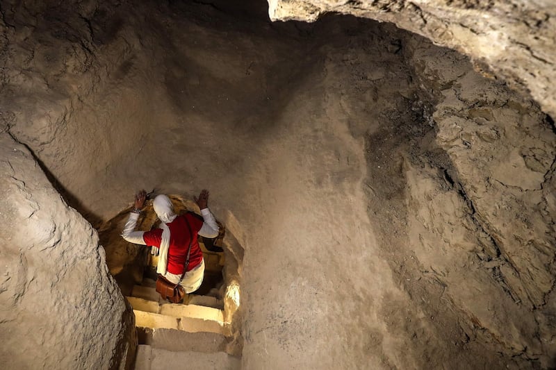 A woman tours inside the Step Pyramid in Egypt's Saqqara necropolis. AFP