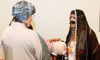 Sheikha Jawaher bint Mohammed Al Qasimi with artisans from Irthi Contemporary Crafts Council.  