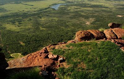 ENTABENI, SOUTH AFRICA - JANUARY 07:  A view of the Extreme 19th hole from the tee, Par 3 631m long, where the tee is at the top of Hanglip mountain and the green is the shape of Africa at the Legend Golf Course on the Entabeni Safari Reserve on January 7, 2009 in Entabeni, South Africa. The Legend Golf Course has been designed by 18 different golfers, each one doing an entire hole, plus an extreme 19th 631m long par 3  (Photo by Richard Heathcote/Getty Images)