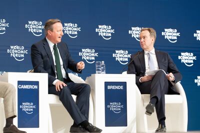 British Foreign Secretary David Cameron and President of the World Economic Forum Borge Brende on stage at the closing plenary in Riyadh. EPA