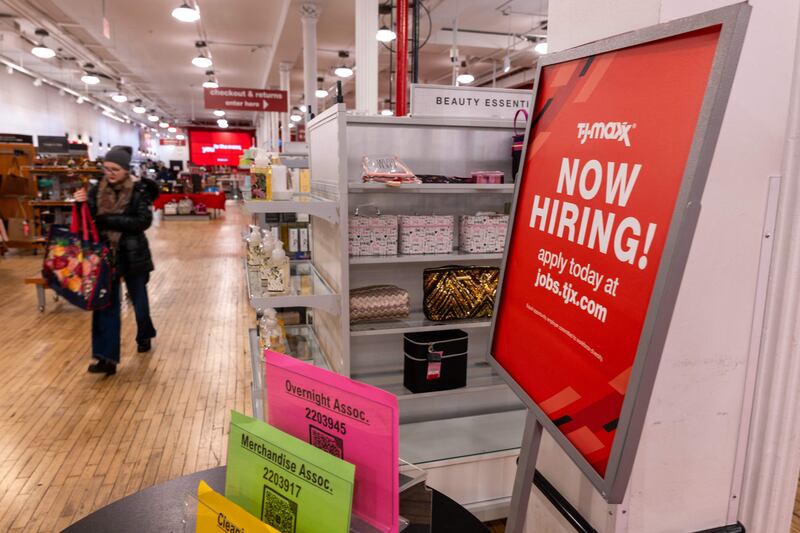 A 'now hiring' sign is displayed in a retail store in Manhattan, New York City. Employers in the US added 353,000 jobs in January against expectations for 185,000 gain and the biggest rise in employment since October 2022. AFP