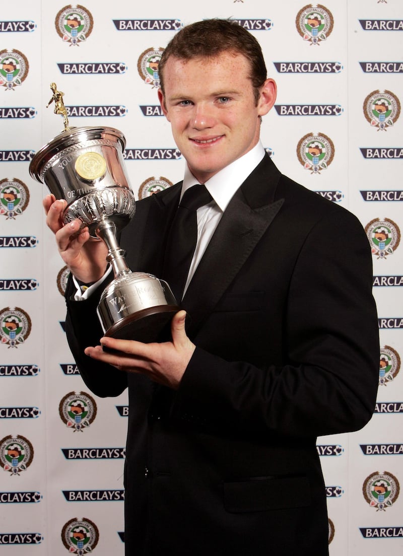 Manchester United's Wayne Rooney with the PFA Young Player of the Year Award he received at the Grosvenor House Hotel in London on April 23, 2006. PA