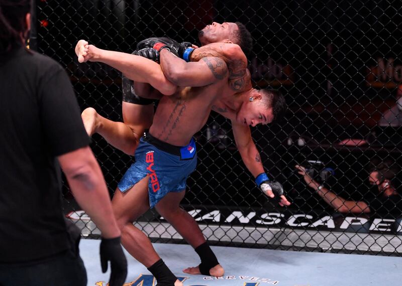 Charles Byrd takes down Maki Pitolo in their middleweight bout during UFC 250. Reuters