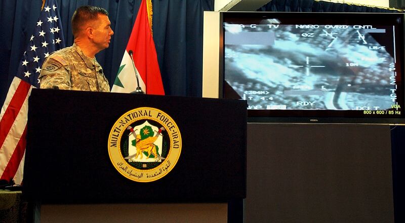 June 8, 2006: Maj Gen Bill Caldwell speaks during a press conference as satellite images are shown of a US air strike that killed the leader of Al Qaeda in Iraq, Abu Musab Al Zarqawi, in a joint US-Iraqi raid. Getty 
