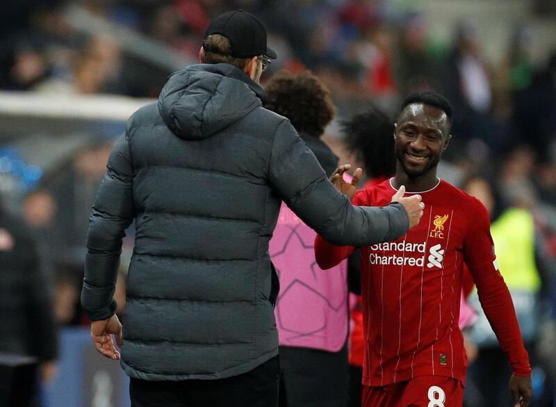 Liverpool's Naby Keita shakes hands with manager Jurgen Klopp after being substituted. Reuters