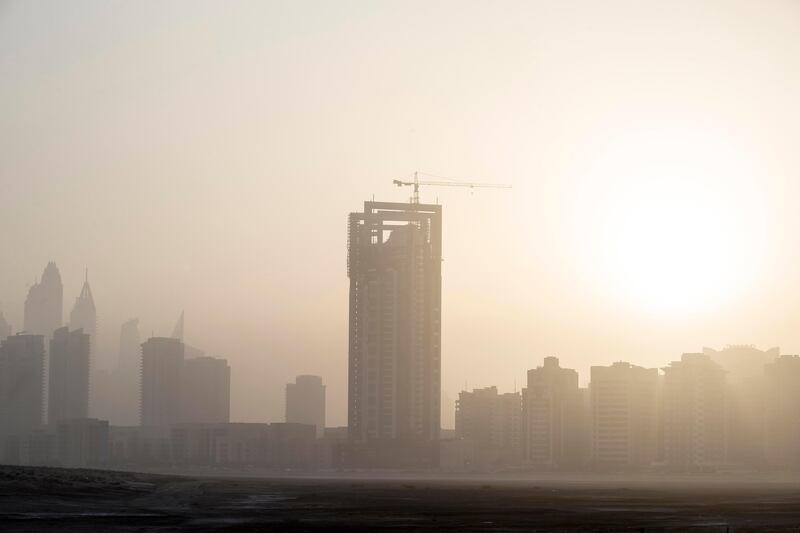 DUBAI, UNITED ARAB EMIRATES, 10 MAY 2017. Standalone photo. As summer temperatures rise visibility drops in the UAE as seen in the dusty sunset over Al Barsha Heights and the Greens. Today saw a heat index of 41 degrees with humidity of 60% while visibility was limited to 4km's. (Photo: Antonie Robertson/The National) ID: STANDALONE. Journalist: None. Section: National. *** Local Caption ***  AR_1005_Standalone_Weather-01.JPG