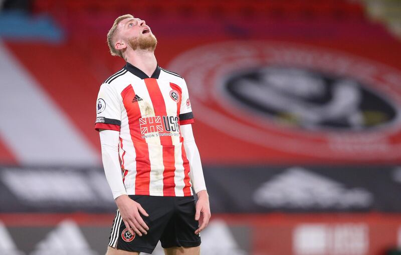 SHEFFIELD, ENGLAND - DECEMBER 26: Oliver McBurnie of Sheffield United looks dejected during the Premier League match between Sheffield United and Everton at Bramall Lane on December 26, 2020 in Sheffield, England. The match will be played without fans, behind closed doors as a Covid-19 precaution. (Photo by Alex Livesey/Getty Images)