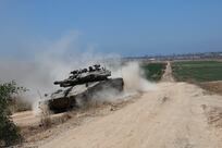Israel fights Hamas in northern Gaza as aid groups warn of catastrophe in Rafah