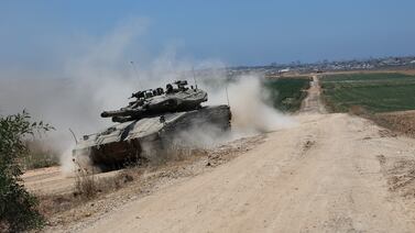 Israeli tanks patrol near the security fence of Jabalia camp in northern Gaza. EPA