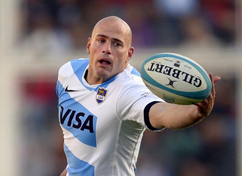 Argentina fly half Felipe Contepomi bobbles the ball during a Test match against England in Buenos Aires on June 15. Argentina hopes joining the Super 15 will help continue its rise as a rugby-playing nation. Juan Mabromata / AFP