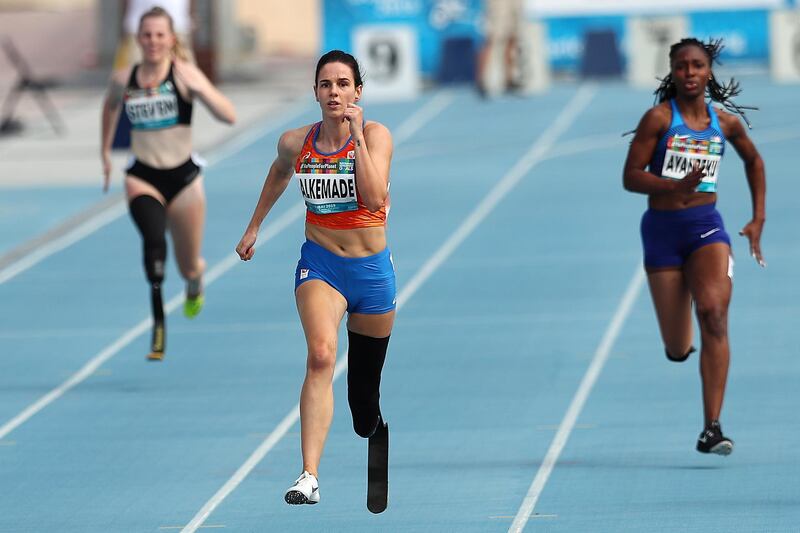 Kimberly Alkemade of Netherlands (C) in action during the Women's 200m T64 final at the World Para Athletics Championships in Dubai, United Arab Emirates.  EPA