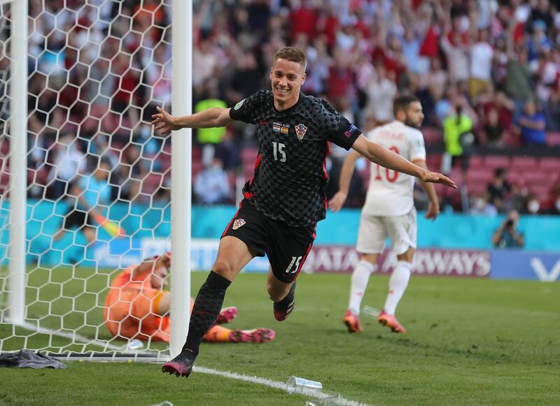 Croatia's Mario Pasalic celebrates after his goal made it 3-3 in injury time at the end of 90 minutes.